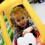 harri_jan16_35 Little girl on the kart track of Toddler Town at Kidabulous