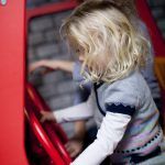 harri_jan16_36 Little girl at the wheel of a car in Toddler Town