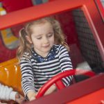 harri_jan16_38 Little girl driving a car at the Toddler Town kart track