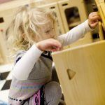 harri_jan16_41 Little girl playing in Toddler Town Cafe