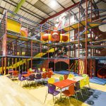 Giant Playframe Seating areas next to giant playframe at Kidabulous