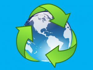 Blue background and recycling logo around the world